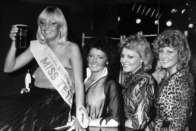 The Yorkshire Evening Post's "Miss Tetley Contest" was held at nightspot Foxes on Harrogate Road in November 1983.  Wendy Pratt, representing the Old Halfway House, at Horbury, was crowned the winner. Looking on, from left, are runners-up Susan Lane, Sally Ann Johnson, and Sharon Hoddy.