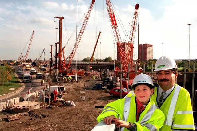 Youngsters from a Leeds primary school donned hard hats and yellow jackets to become engineers for the day, when they visited the construction site for the new M621/M1 link road in Leeds. The children from Ingram Road Primary School in Holbeck were shown progress on the £15m scheme. Pictured is pupil Thomas Hall, 8, with section engineer Mohammed Jajeh.