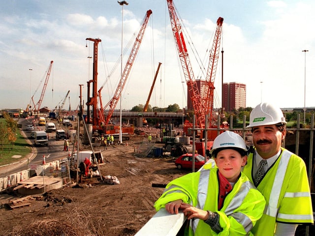 Youngsters from a Leeds primary school donned hard hats and yellow jackets to become engineers for the day, when they visited the construction site for the new M621/M1 link road in Leeds. The children from Ingram Road Primary School in Holbeck were shown progress on the £15m scheme. Pictured is pupil Thomas Hall, 8, with section engineer Mohammed Jajeh.