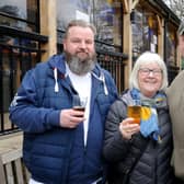This year's North Leeds Charity Beer Festival was the 11th to be organised. Pictured raising a glass with Barbara Learoyd are David and Robert Newsham.