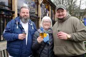 This year's North Leeds Charity Beer Festival was the 11th to be organised. Pictured raising a glass with Barbara Learoyd are David and Robert Newsham.