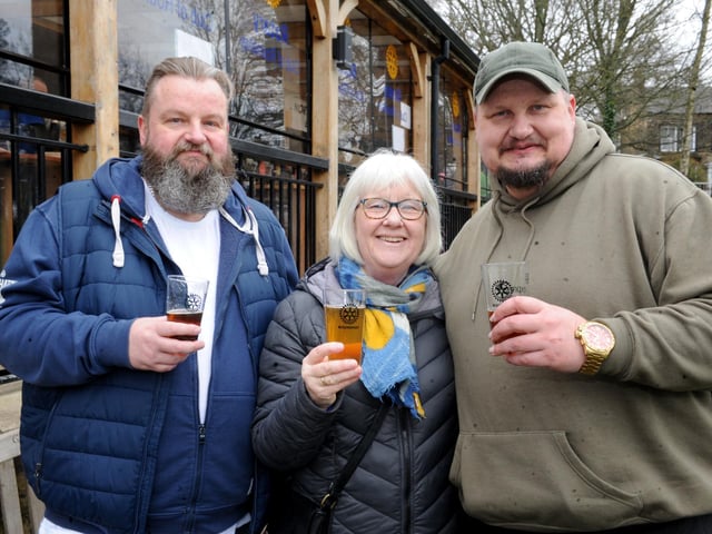 This year's North Leeds Charity Beer Festival was the 11th to be organised. Pictured raising a glass with Barbara Learoyd are David and Robert Newsham.