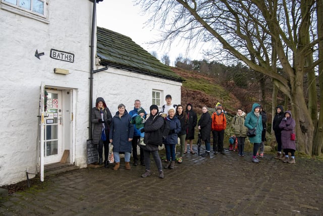 Visitors queue at White Wells on Ilkley Moor for the traditional New Years Day dip in the plunge pool at thew attraction in the spa town