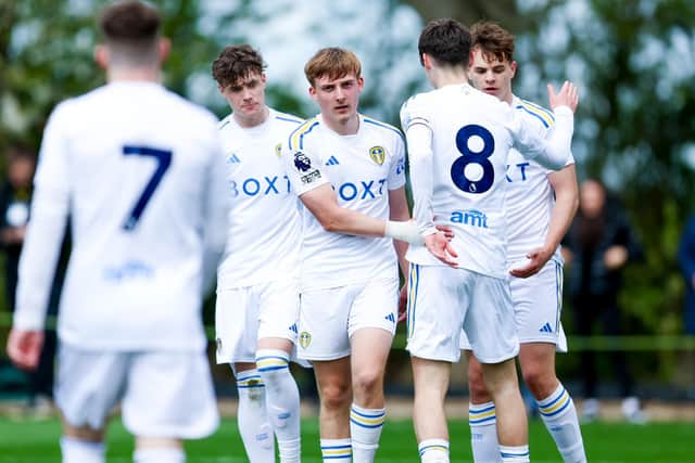 STRONG ENDING: From Leeds United's under-21s, pictured above as Joe Snowdon, centre, celebrates netting in Monday's 3-0 victory against Derby County's under-21s at Thorp Arch. Picture by LUFC.