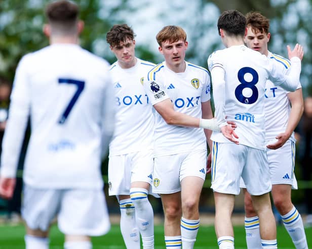 STRONG ENDING: From Leeds United's under-21s, pictured above as Joe Snowdon, centre, celebrates netting in Monday's 3-0 victory against Derby County's under-21s at Thorp Arch. Picture by LUFC.