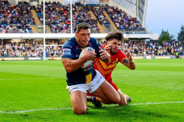 Ryan Hall goes over for the first of his two tries in Leeds Rhinos' 46-4 win against Catalans Dragons last week. Picture by Allan McKenzie/SWpix.com.