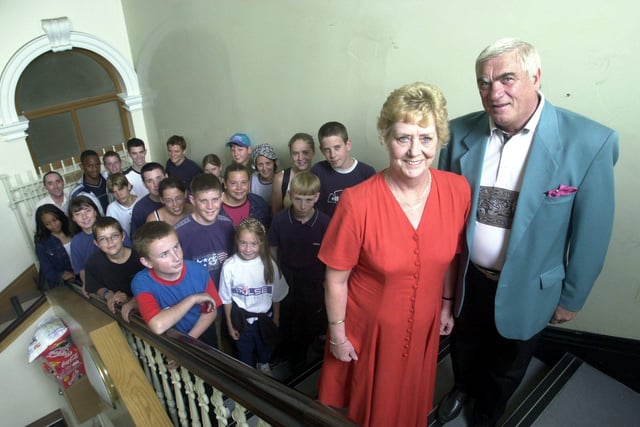 The Mayor and Mayoress of Morley, Frank and Wendy Tighe, give children a civic send-off at Morley Town Hall, before they go camping in August 2001.