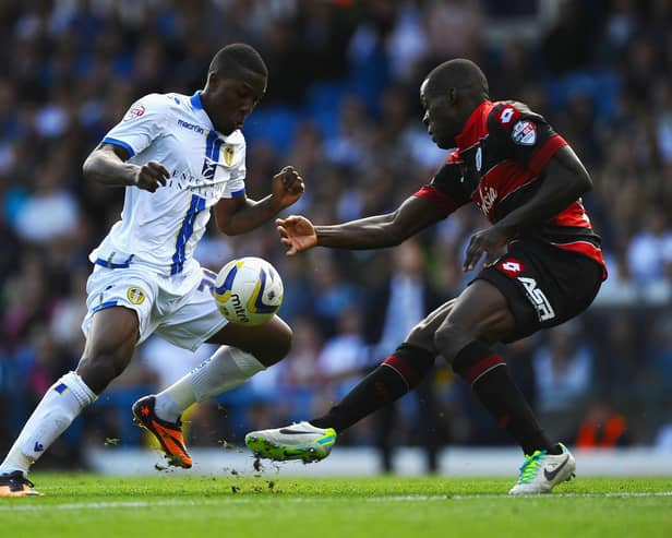 INTERNATIONAL TREBLE: For Dominic Poleon, left, pictured in action for Leeds United in the Championship clash against Queens Park Rangers at Elland Road of August 2013 and battling it out with Nedum Onuoha. Photo by Laurence Griffiths/Getty Images.