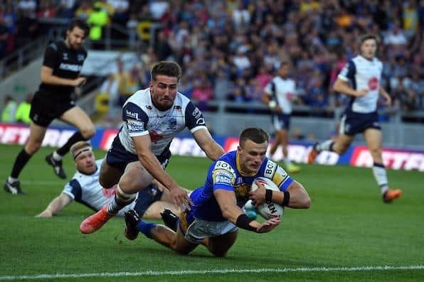 Ash Handley scores Leeds' first try in the win over Warrington. Picture by John Rushworth/SWpix.com.