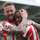 BRENTFORD, ENGLAND - SEPTEMBER 03: Ivan Toney of Brentford celebrates scoring their side's third goal with teammate Pontus Jansson during the Premier League match between Brentford FC and Leeds United at Brentford Community Stadium on September 03, 2022 in Brentford, England. (Photo by Steve Bardens/Getty Images)