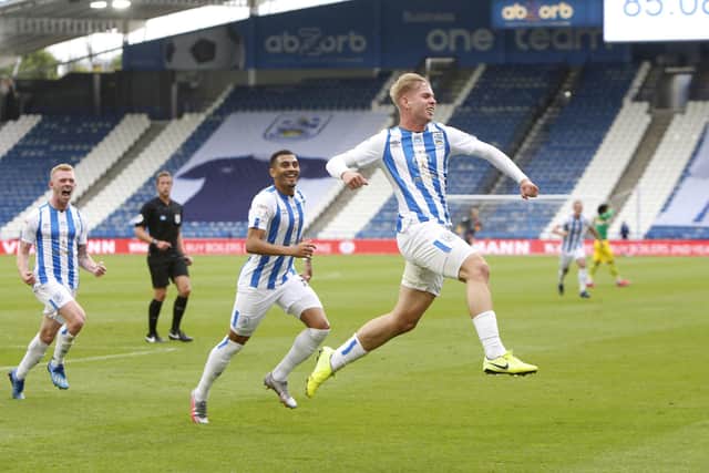 HUDDERSFIELD, ENGLAND - JULY 17: Emile Smith Rowe of Huddersfield Town celebrates his goal to make it 2-1 during the Sky Bet Championship match between Huddersfield Town and West Bromwich Albion at John Smith's Stadium on July 17, 2020 in Huddersfield, England. (Photo by John Early/Getty Images)