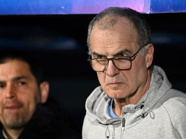 Bielsa is assisted by long-time coaching partner Pablo Quiroga, pictured out of focus behind the Argentine (Photo by EITAN ABRAMOVICH/AFP via Getty Images)