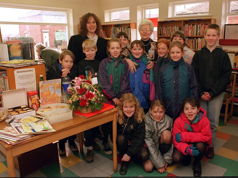 Eileen Roberts is pictured with pupils from Methley Junior School and headteacher Mrs J.Reid, on her retirement after 37 years as a librarian at Methley Library.