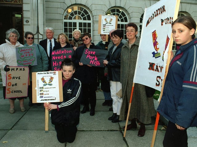 November 1998 and a group of protesters stand outside the Civic Hall demonstrating about the school's possible closure.