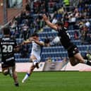 Brodie Croft lands a golden-point winning drop goal for Leeds Rhinos at home to London Broncos in July. He did the same in the away match two months later. Picture by Jonathan Gawthorpe.