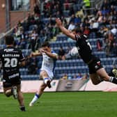 Brodie Croft lands a golden-point winning drop goal for Leeds Rhinos at home to London Broncos in July. He did the same in the away match two months later. Picture by Jonathan Gawthorpe.