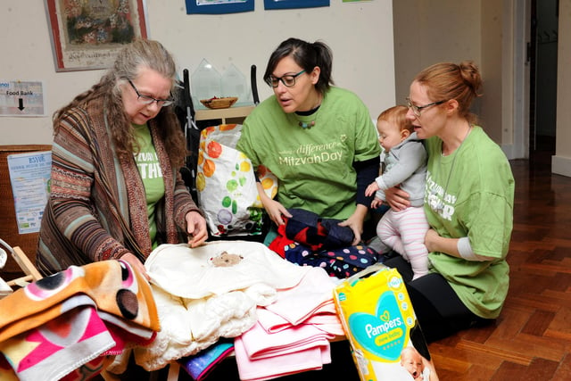 Members from the Jewish community donated a range of items for Leeds Baby Bank in the week leading up to Mitzvah Day, dropping off their donations at the Sinai Synagogue. Pictured are education co-ordinator Helen Michael, community outreach officer Becky Teiger, and Vicki Porcelli with baby Izzy.