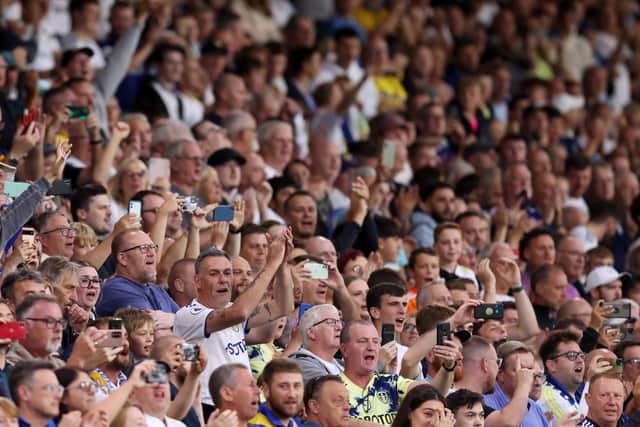 LEEDS, ENGLAND - AUGUST 24: Leeds United fans applaud during the Carabao Cup Second Round match between Leeds United and Barnsley at Elland Road on August 24, 2022 in Leeds, England. (Photo by George Wood/Getty Images)
