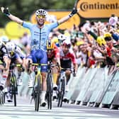 Sir Mark Cavendish celebrates as he crosses the line in Saint-Vulbas to win his record-breaking 35th Tour de France stage (Picture: JASPER JACOBS/BELGA MAG/AFP via Getty Images)