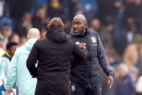 Leeds United manager Daniel Farke and Huddersfield Town manager Darren Moore (right) shake hands after the final whistle of the Sky Bet Championship match at Elland Road, Leeds. Picture date: Saturday October 28, 2023. PA Photo. See PA story SOCCER Leeds. Photo credit should read: Danny Lawson/PA Wire.