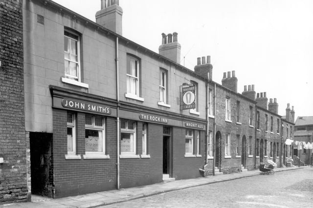 The Rock Inn on Jenner Street. A hanging sign for John Smiths Magnet Ales is on the wall. Pictured in June 1960. This pub has now been demolished.
