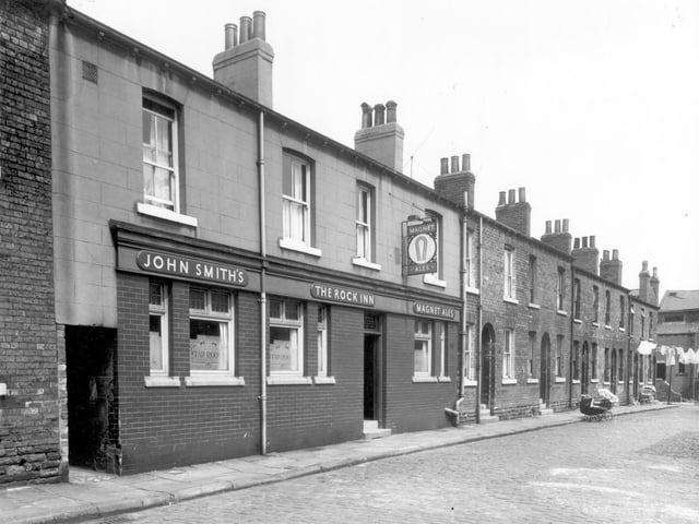 The Rock Inn on Jenner Street. A hanging sign for John Smiths Magnet Ales is on the wall. Pictured in June 1960. This pub has now been demolished.