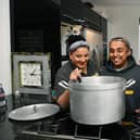 Tina Suryavansi, left, works full time as a senior rota coordinator in A&E while also running operations for Homeless Hampers in her spare time with her family. Photo: Jonathan Gawthorpe