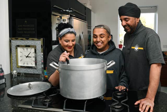 Tina Suryavansi, left, works full time as a senior rota coordinator in A&E while also running operations for Homeless Hampers in her spare time with her family. Photo: Jonathan Gawthorpe