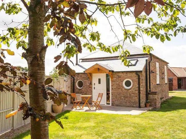 This lovingly-restored chapel is located in the peaceful village of Warthill, just outside York. The unique, 180-year-old building has been sensitively renovated, combining charming original features with modern, open-plan living. It has a rating of five stars, based on 30 reviews. One guest said: "Beautifully renovated former Chapel. Bright and airy inside, amazing shower and super comfy bed. Would definitely recommend it."