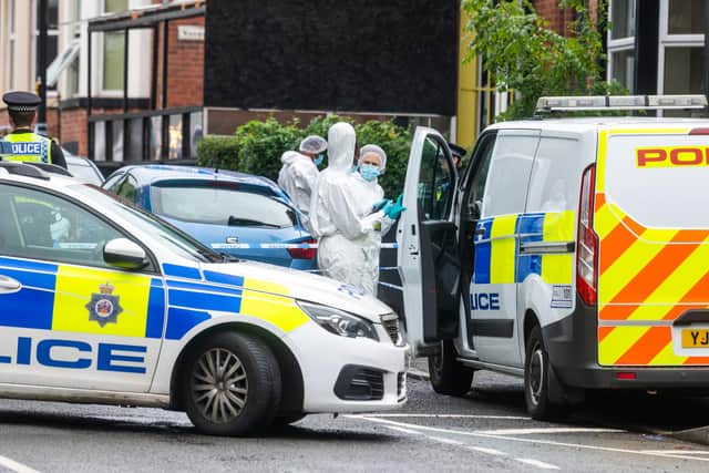 Victoria Road and Kirkstall Road remain cordoned off by police as forensic examinations take place. Picture: James Hardisty