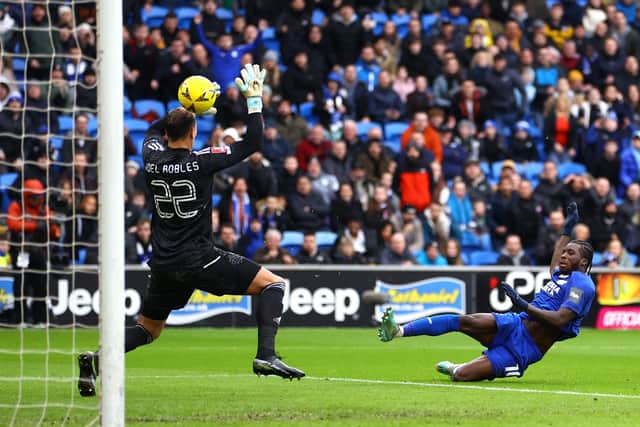 CARDIFF, WALES - JANUARY 08: Sheyi Ojo of Cardiff City scores the team's second goal past Joel Robles of Leeds United during the Emirates FA Cup Third Round match between Cardiff City and Leeds United at Cardiff City Stadium on January 08, 2023 in Cardiff, Wales. (Photo by Michael Steele/Getty Images)