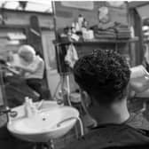 Tracy Mangan is an award-winning barber and single mother of three children