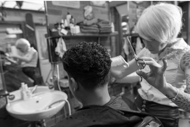 Tracy Mangan is an award-winning barber and single mother of three children