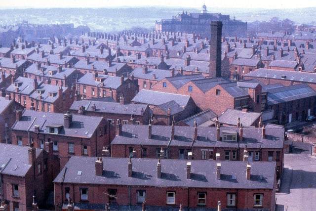 This view from the top of Christ Church tower  in April 1969 looks across streets of terraced houses towards West Leeds High School. Highthorne Street is bottom right with the Paisley's, Greenock's and Edinburgh streets in view.