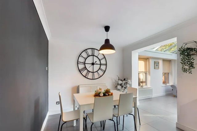 The dining area leads to the bright and spacious conservatory