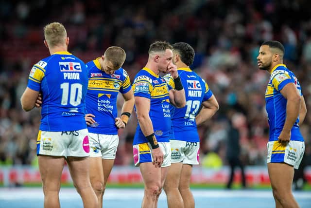 There's no hiding the dfisappointment of Kruise Leeming, right and teammates after the final whistle at Old Trafford. Picture by Bruce Rollinson.