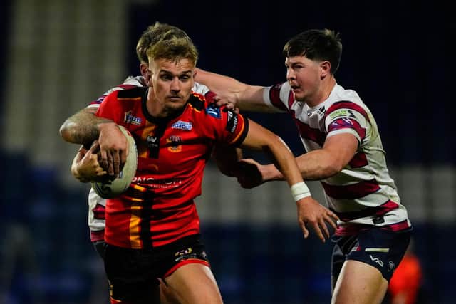 Luke Hooley, left, in action for Bradford Bulls against Oldham last month. Picture by Olly Hassell/SWpix.com.