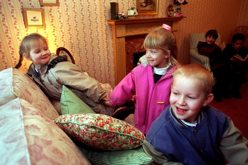 January 1996 and pupils from Sharpe Lane Primary explore a new Haslam Homes house on Heritage Chasein Belle Isle  where they were learning how they are planned and built.