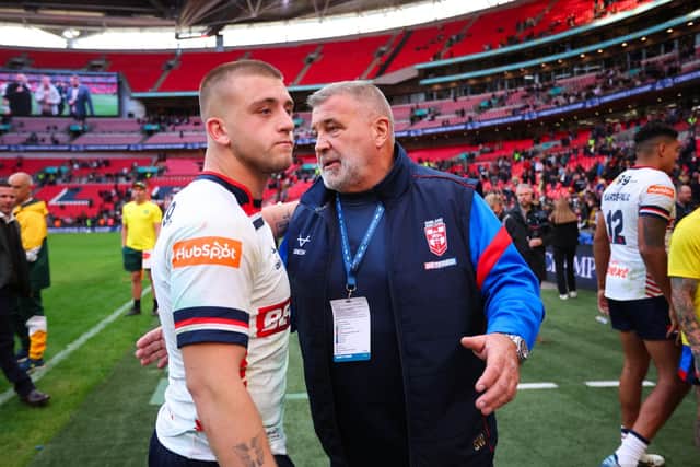 England coach Shaun Wane, right, speaks to half-back Mikey Lewis following the first Test loss to Australia at Wembley. Picture by Ed Sykes/SWpix.com.