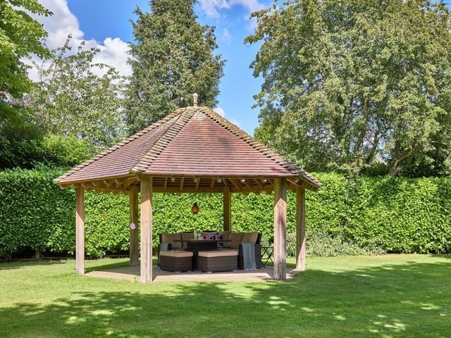 The outdoor space at Lightcliffe House is a nature lover’s dream with sweeping gardens, a covered timber pavilion and a stone patio.