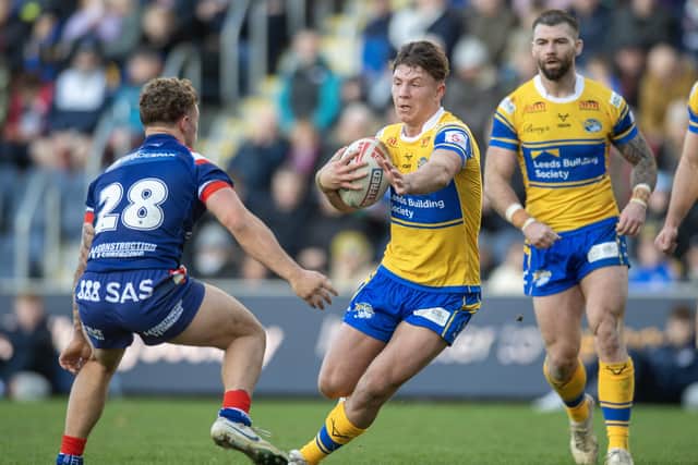 Joe Diskin, seen in action against Wakefield Trinity last Boxing Day, is one of 11 Leeds Rhinos players named in the Yorkshire academy squad. Picture by Tony Johnson.
