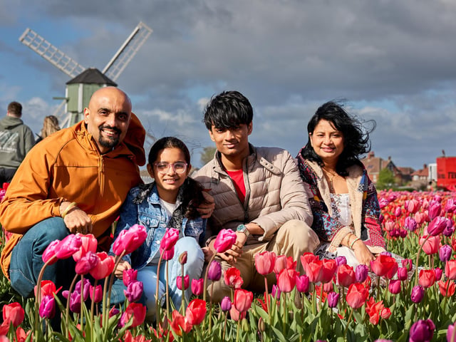 Bhupesh, Medha, Shaurya and Vivika at Farmer Copleys' Tulip Festival.