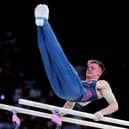 FINAL-BOUND: Leeds Luke Whitehouse performs on the parallel bars during the Artistic Gymnastics, Men's Qualification at the Bercy Arena . Picture: Peter Byrne/PA
