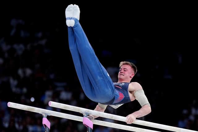 FINAL-BOUND: Leeds Luke Whitehouse performs on the parallel bars during the Artistic Gymnastics, Men's Qualification at the Bercy Arena . Picture: Peter Byrne/PA