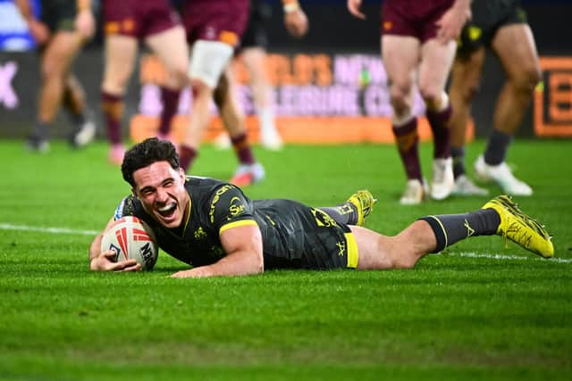 Brodie Croft celebrates scoring one of his four tries during Leeds Rhinos' 56-22 win at Huddersfield Giants. Picture by Olly Hassell/SWpix.com.