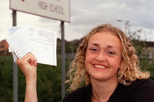 This is A-level student Joanna Hartley who was celebrating her five grade As and entry to Oxford University. She is pictured outside her school, Corpus Christi, on Halton Moor in August 1999.