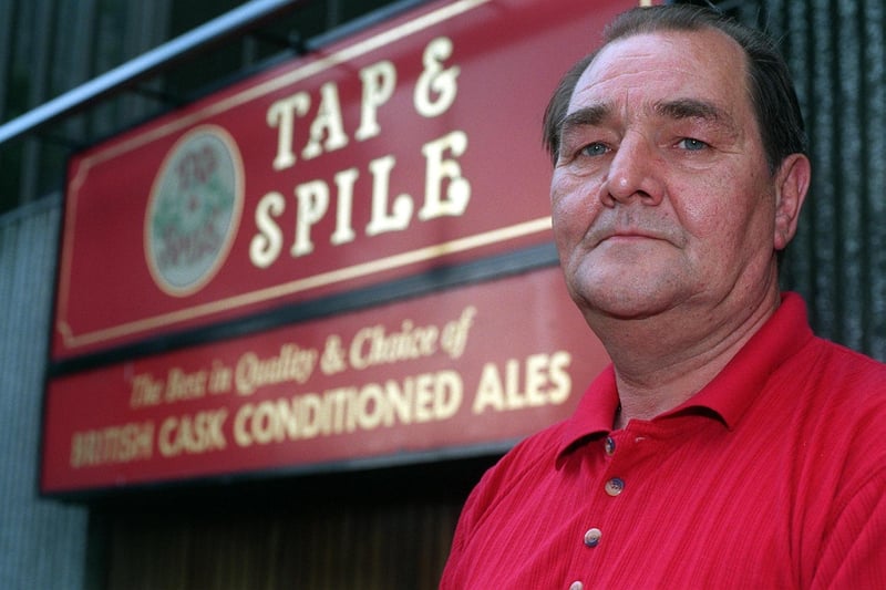This is publican Ralph Hartley next to the Tap and Spile in Leeds city centre which was threatened with closure in June 1998.