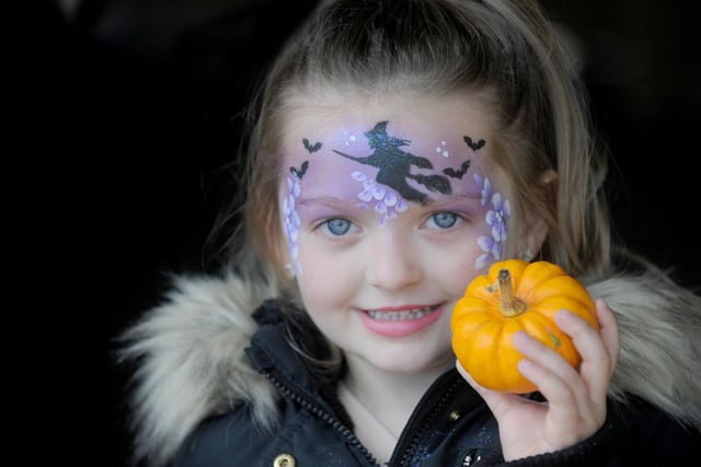 Vienna Kedzierski, five, with her mini pumpkin