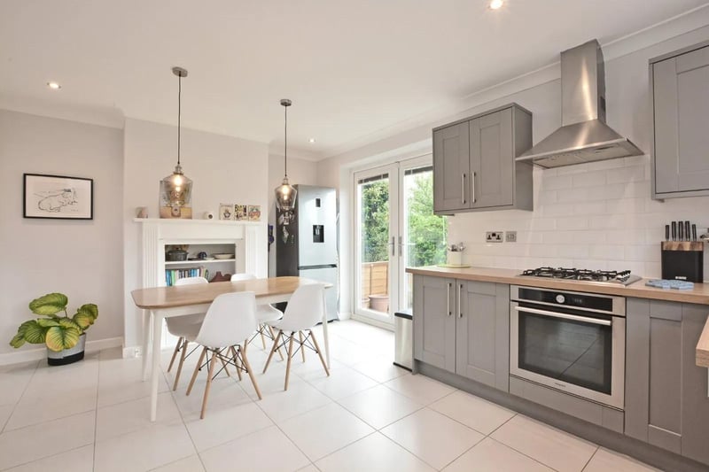 To the rear is a beautiful open plan and recently fitted dining kitchen with an attractive range of base & wall storage units.