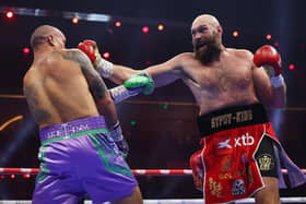 ]Tyson Fury punches Oleksandr Usyk in Riyadh, Saudi Arabia. (Photo by Richard Pelham/Getty Images)